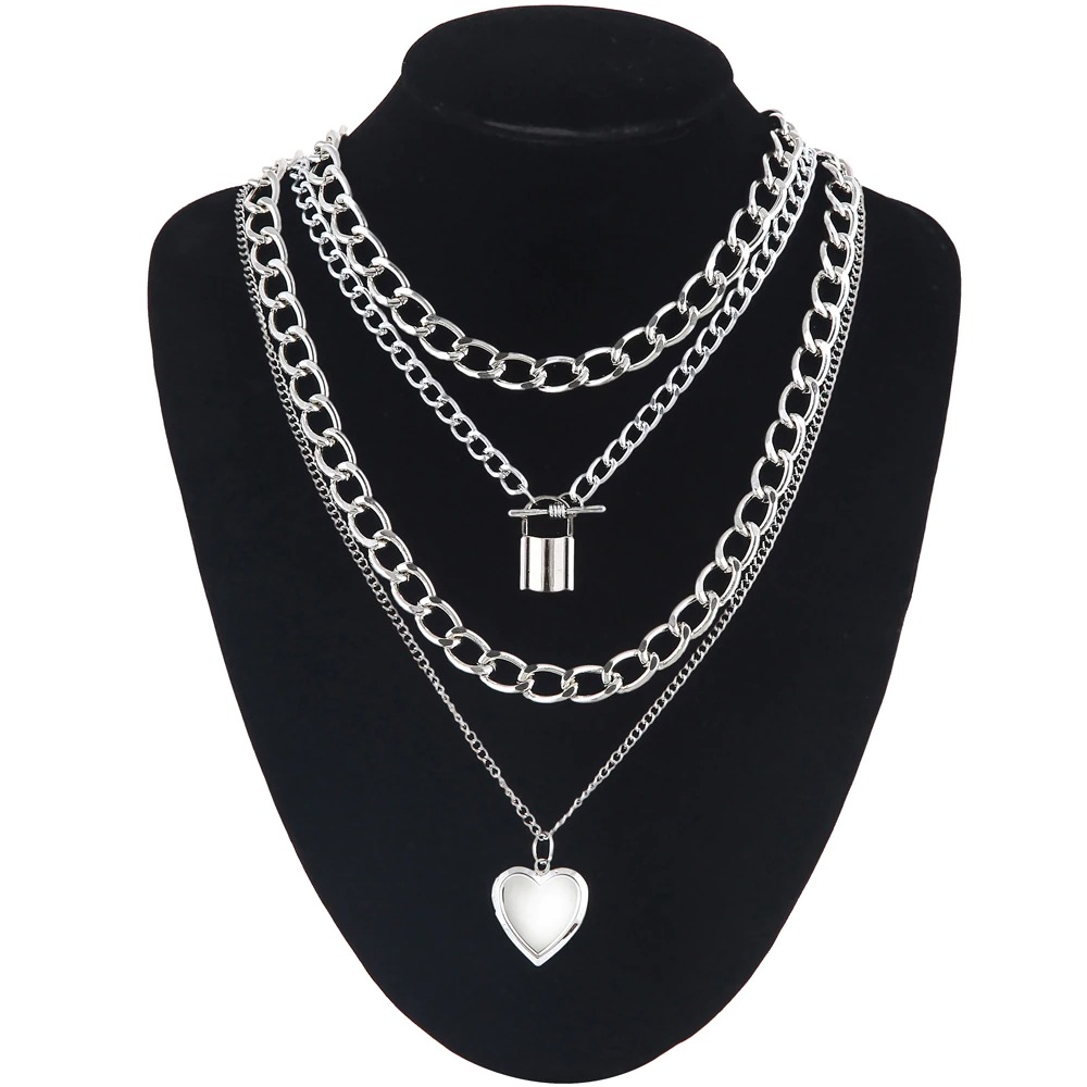 Layered silver chain necklace with heart pendant for women, perfect for trendy fashion outfits.