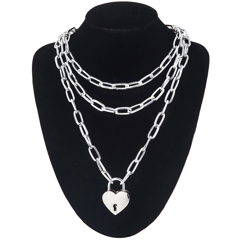 Layered chain necklace with heart pendant for women, stylish and perfect for various outfits.