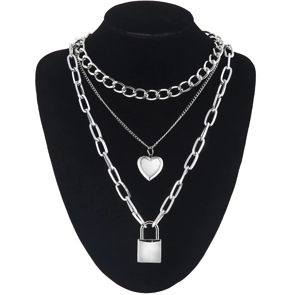 Layered chain necklace for women featuring heart and padlock charms, perfect for trendy fashion looks.