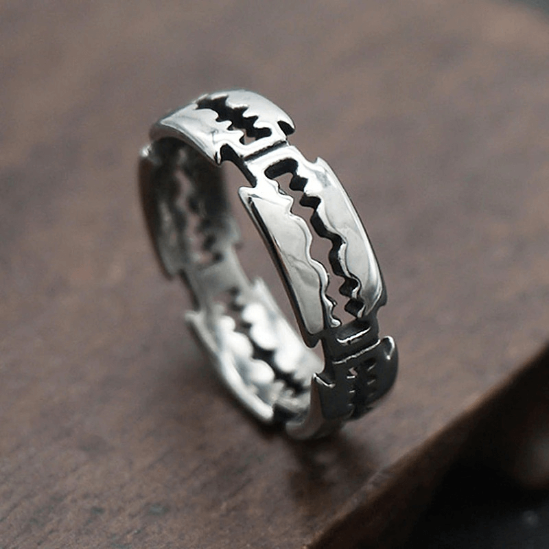 Unisex stainless steel bladed ring, punk rock accessory, stylish silver color for men and women.