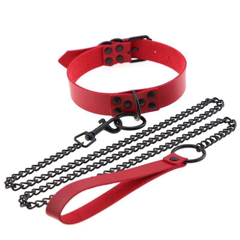 Unisex red faux leather choker with black chain and bondage details, perfect for goth and edgy styles.