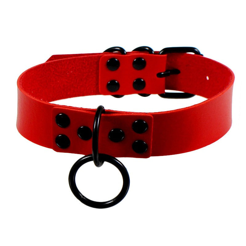 Red faux leather choker collar with black studs and ring, stylish for unisex gothic fashion and themed parties.