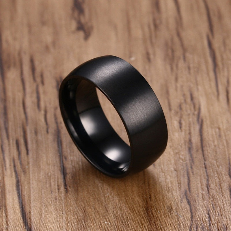 Classic black stainless steel ring with a matte finish, perfect for casual or formal occasions.