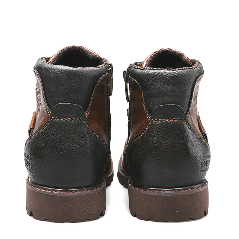 Back view of stylish handmade men's ankle boots in brown and black, showcasing quality leather and classic design.