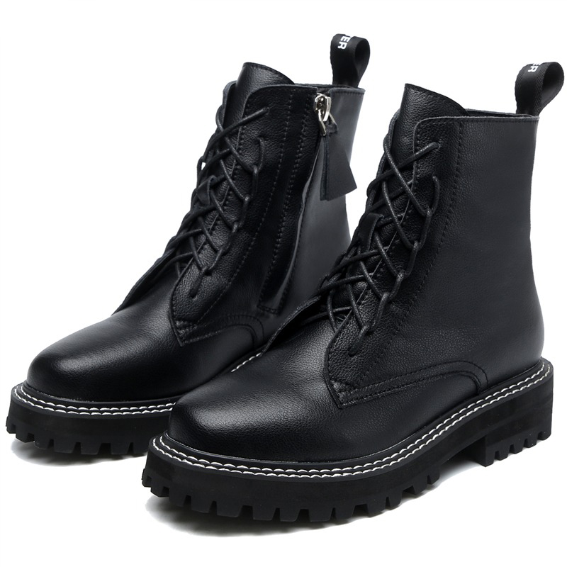 Classic black women's ankle boots featuring lace-up and zip design for a stylish, comfortable look.