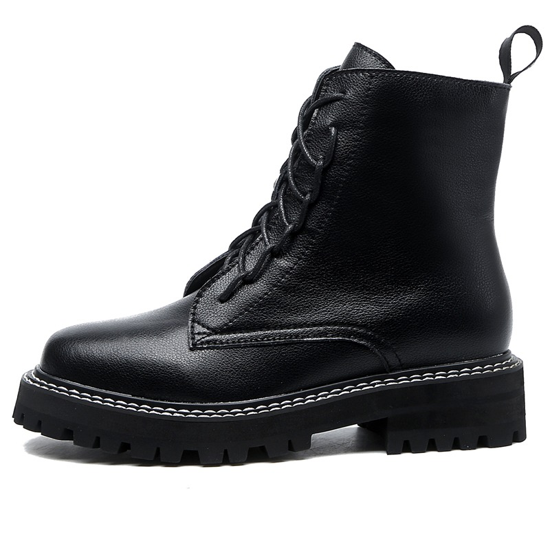 Classic black women's ankle boots with laces and chunky sole, perfect for casual outings and long walks.