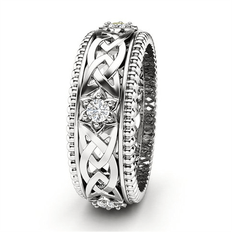 Elegant classic Celtic knot zircon flower ring for unisex; vintage jewelry design perfect for any outfit.