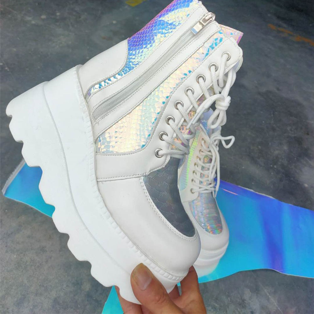Stylish white platform ankle boots with iridescent detailing, perfect for vibrant spring or autumn outfits.
