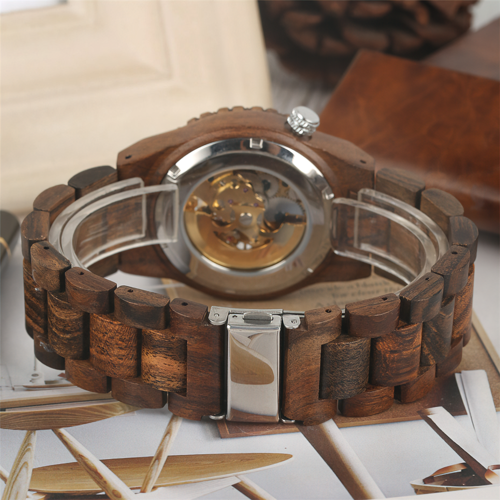 Classic wooden automatic men’s watch showcasing unique hollow design and wooden bracelet, perfect for vintage outfits.