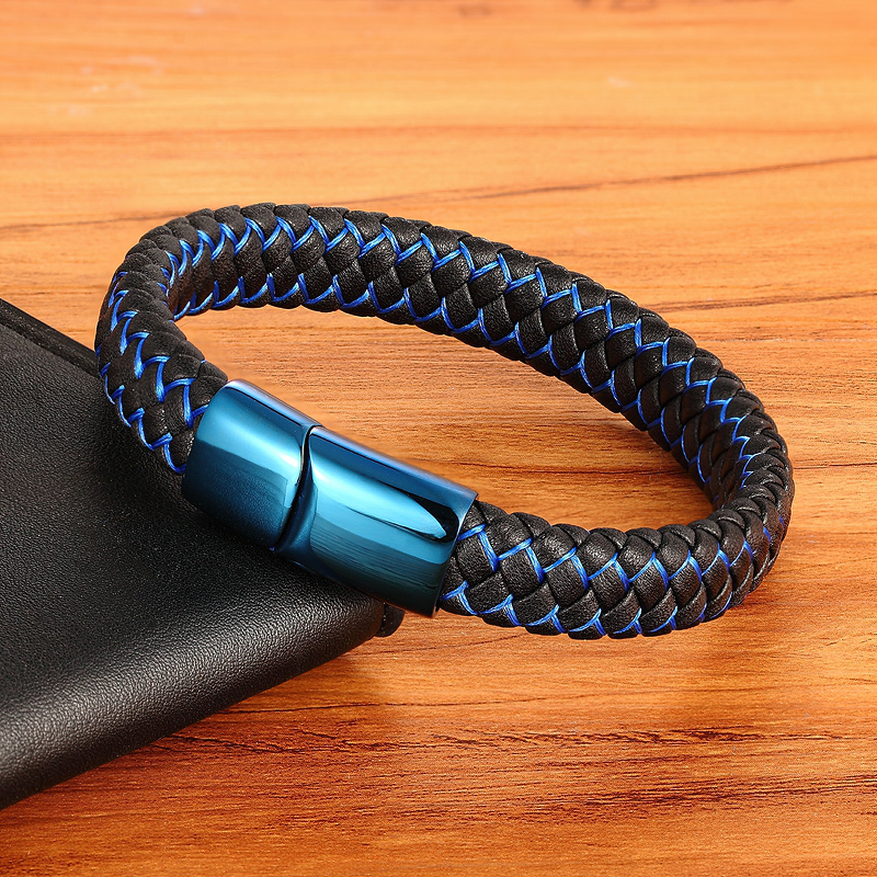 Classic luxury blue braided leather bracelet with stainless steel buckle on wooden background.