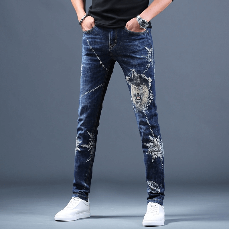 Slim-fit printed jeans for men with unique designs, showcasing an alternative style and trendy look.