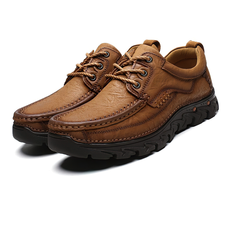 Classic brown genuine leather lace-up shoes for men, perfect for alternative style wardrobes.
