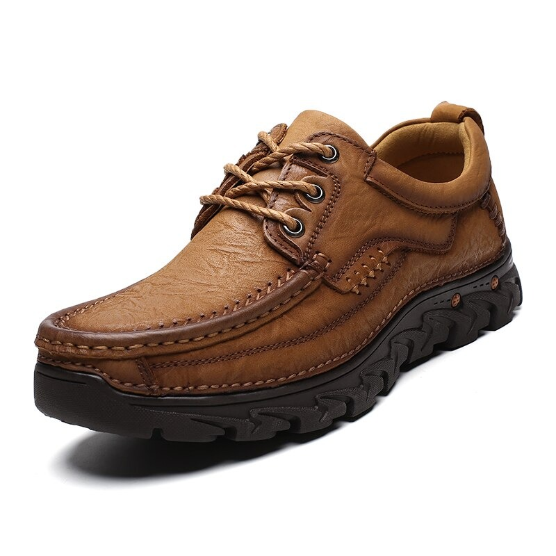 Classic brown leather lace-up shoes for men, perfect for alternative style and casual outings.
