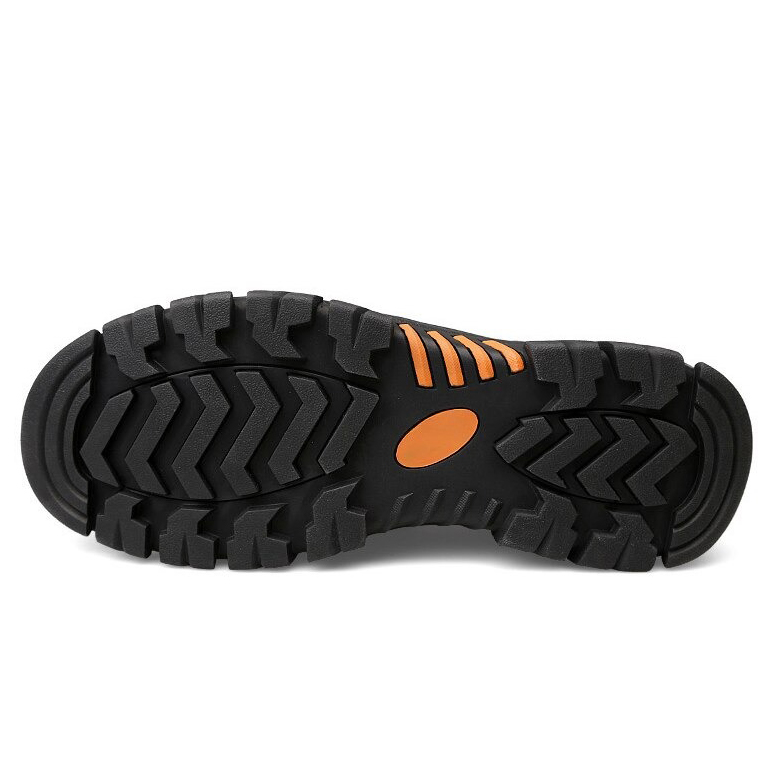 Bottom view of a rugged black shoe sole with orange accents and textured tread for grip.