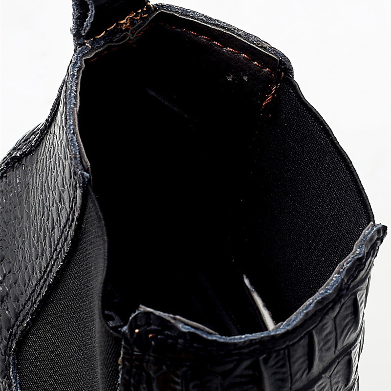 Interior view of men's PU leather ankle boots showcasing texture and material design.