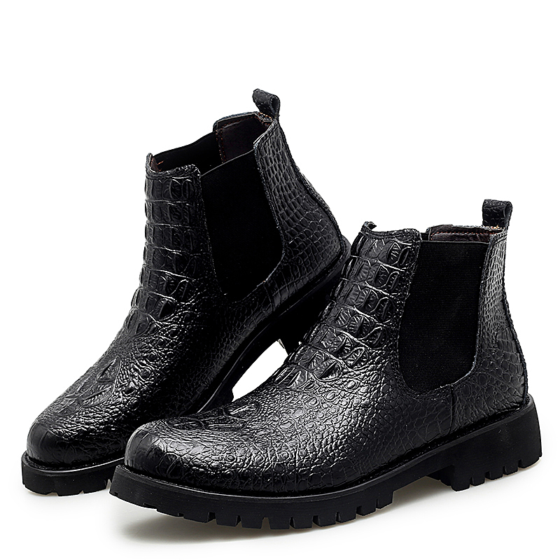 Stylish black PU leather ankle boots with textured surface, perfect for modern casual and business looks.