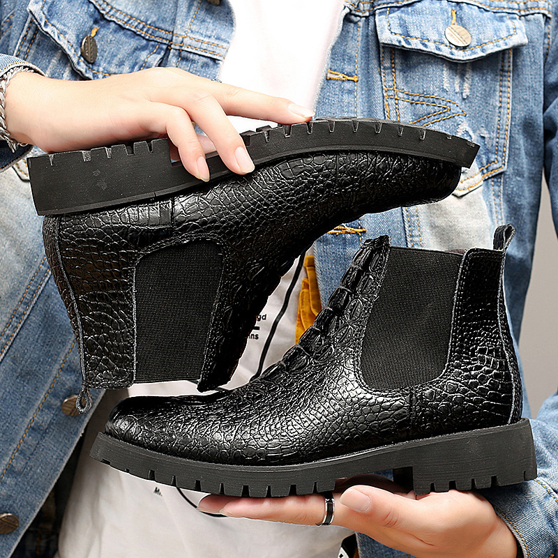 Stylish black PU leather ankle boots for men, featuring a modern design and durable sole, perfect for casual wear.