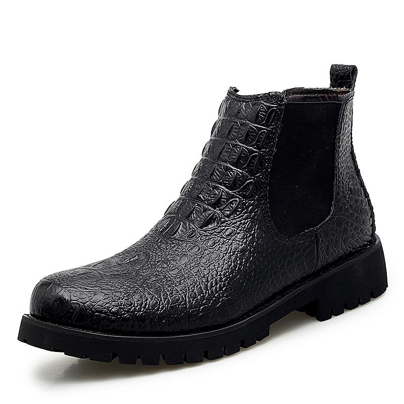 Men's black PU leather ankle boots with textured design, perfect for casual and business wear.