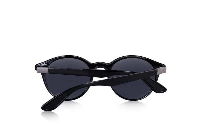 Classic retro oval-frame polarized sunglasses with UV400 protection and TR90 legs, stylish gothic accessory.