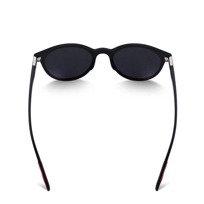 Stylish UV400 retro oval-frame polarized sunglasses with TR90 legs, perfect for gothic and rock looks.