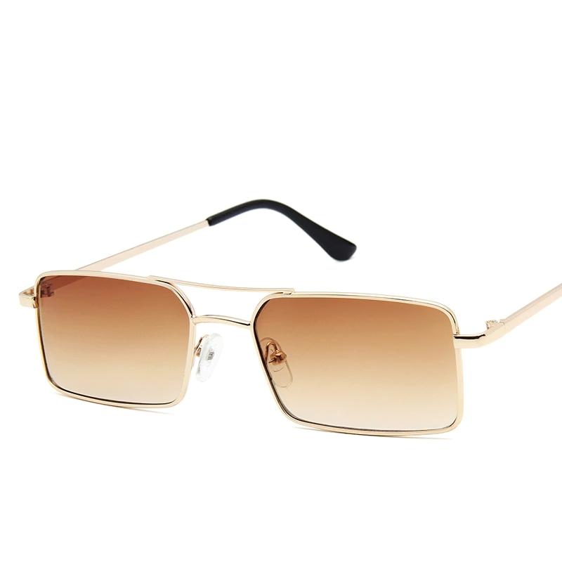 Classic retro sunglasses for women in gold with brown gradient lenses, stylish unisex eyewear accessory.