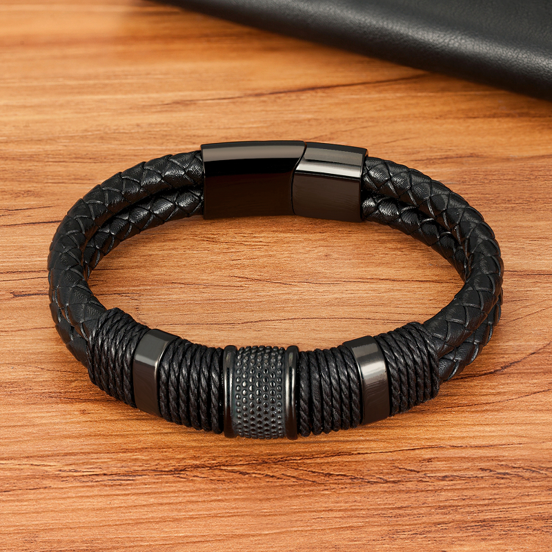 Classic stainless steel and genuine leather bracelet, double-layered, black and gold design, perfect for men's fashion.