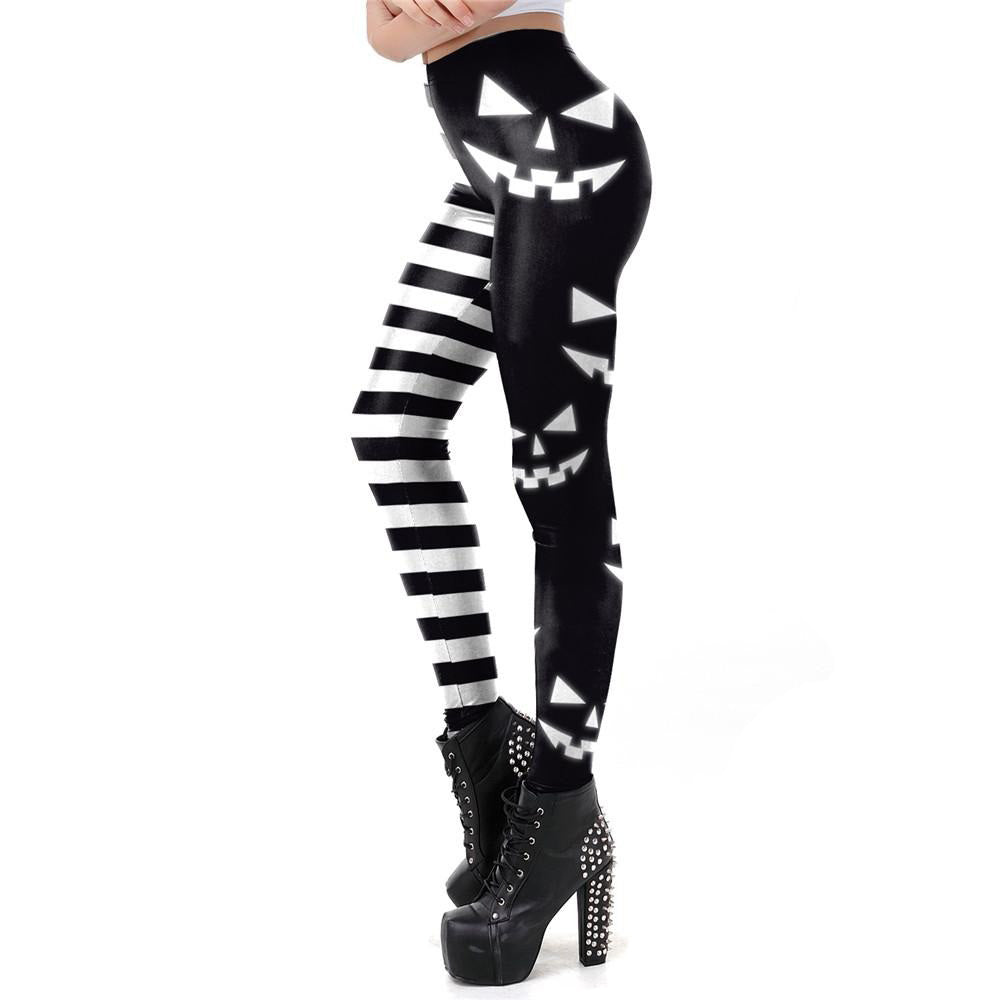 Classic women's Halloween leggings with pumpkin faces and stripes, perfect for workout or Halloween outfits.
