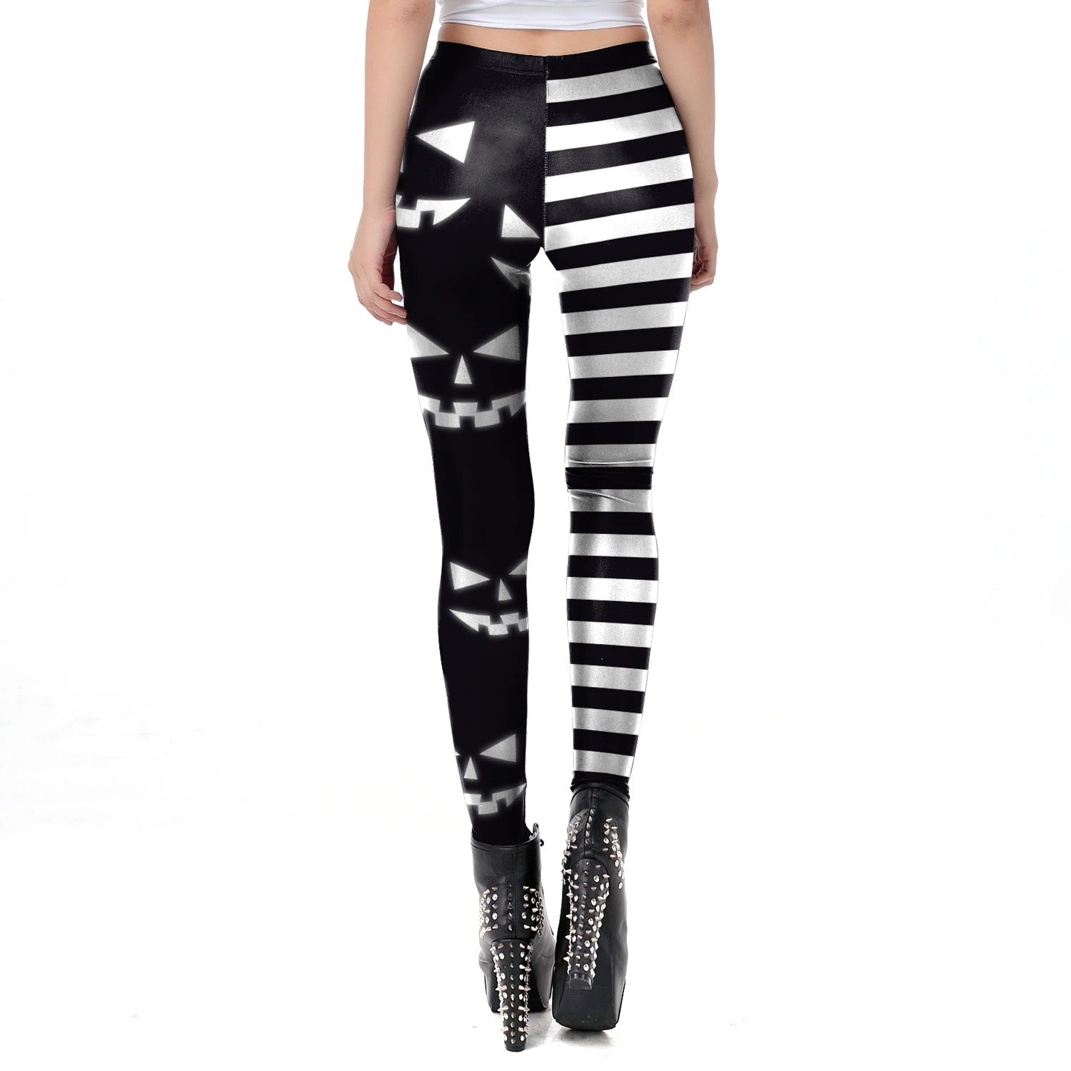 Sexy women's Halloween leggings with striped and pumpkin face print, perfect for autumn workouts and festive outfits.