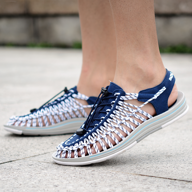 Men's summer genuine leather sandals featuring breathable design and elastic lace-up, perfect for stylish comfort.