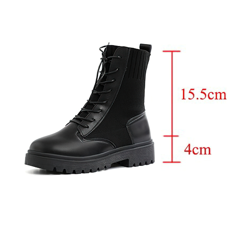Warm lace-up ankle boots in black with a flexible sole, perfect for casual style and comfortable wear.