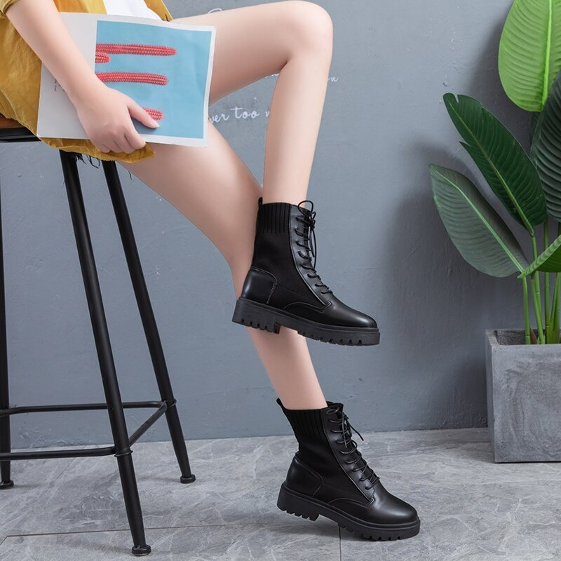 Stylish warm lace-up ankle boots for women, showcased on a sitting model with casual outfit, highlighting flexible sole.