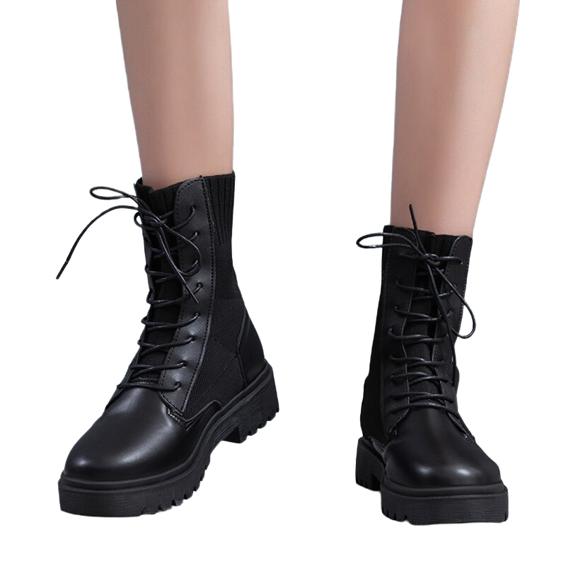 Black lace-up ankle boots for women with flexible soles, perfect for casual style and all-day comfort.