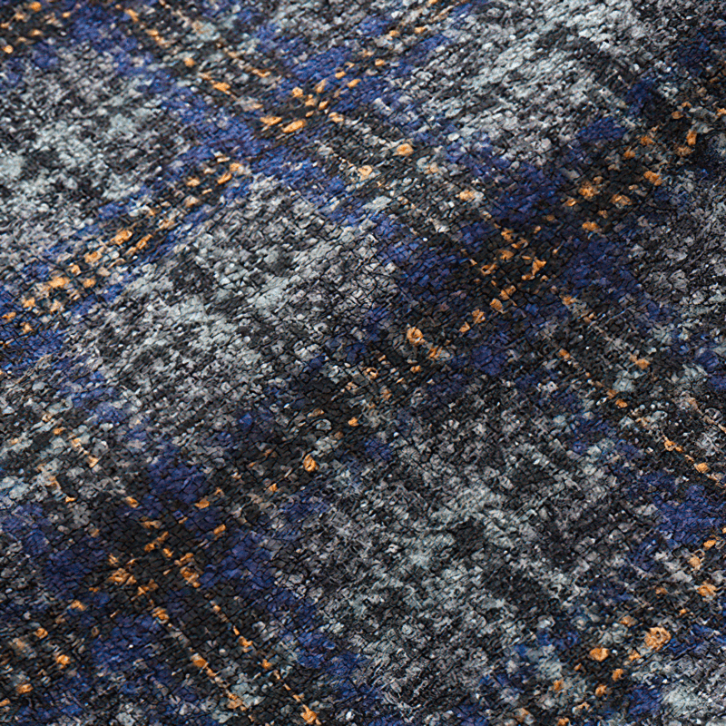 Close-up of thick woolen plaid fabric featuring blue and orange patterns, perfect for a stylish men's casual shirt.