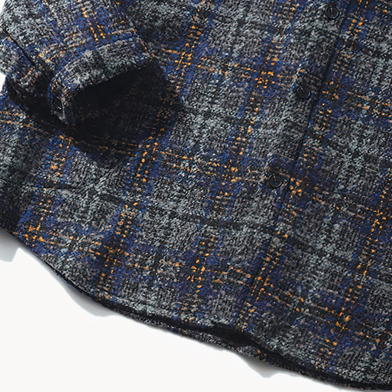 Men's thick woolen plaid shirt in gray and blue with button detail, perfect for a stylish casual look.
