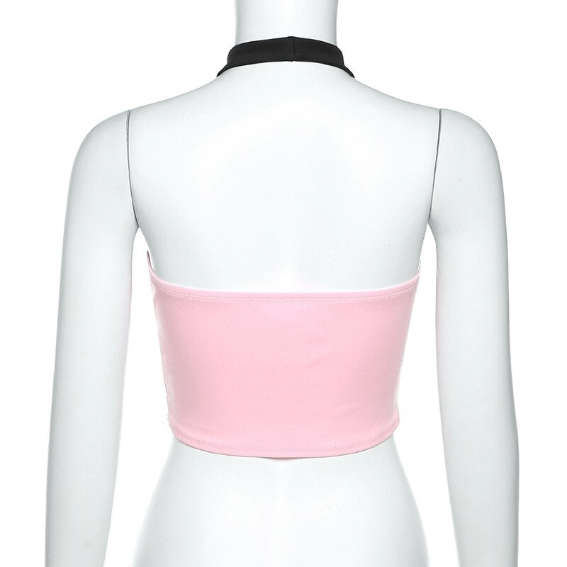 Back view of women's contrast color halter top in pink and black, showcasing aesthetic fashion style.