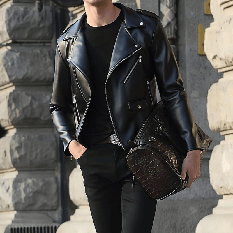 Stylish man wearing a black faux leather biker jacket with long sleeves, perfect for a trendy outfit.