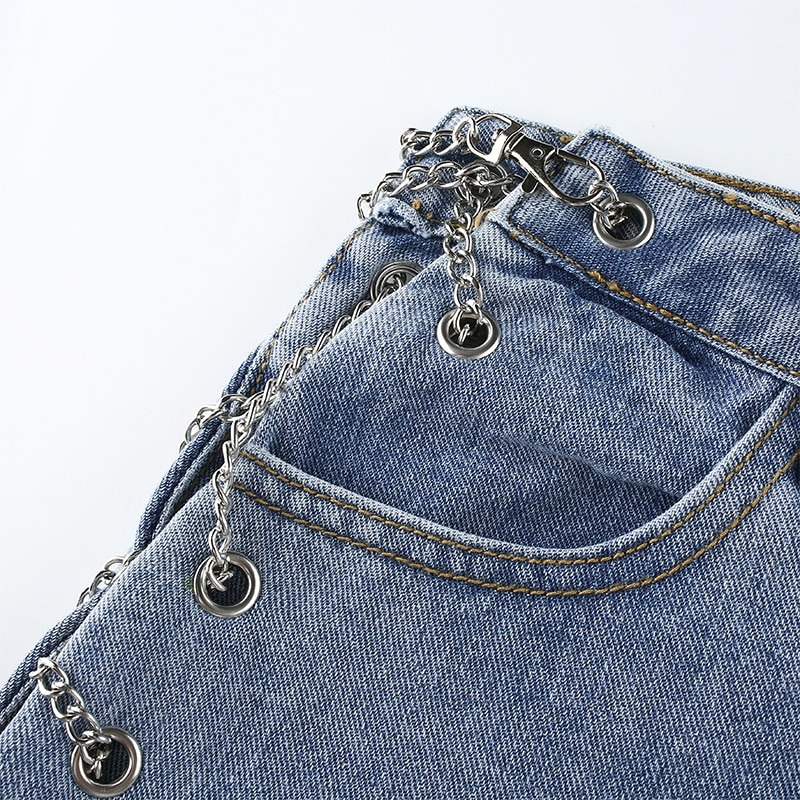 Close-up of high waist women's jeans featuring stylish chains, perfect for casual outfits and enhancing your look.