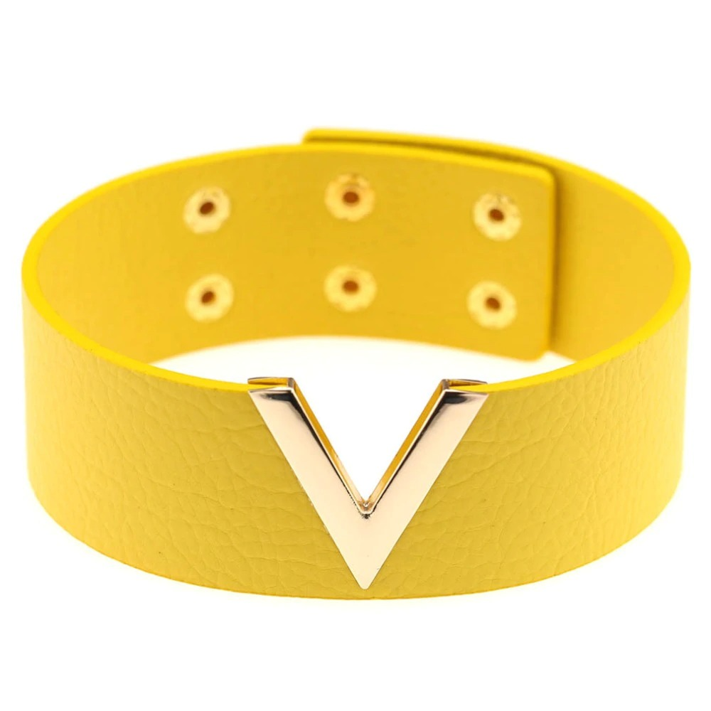Stylish yellow PU leather bracelet with gold V-shaped metal accent, perfect punk accessory for bold fashion statements.