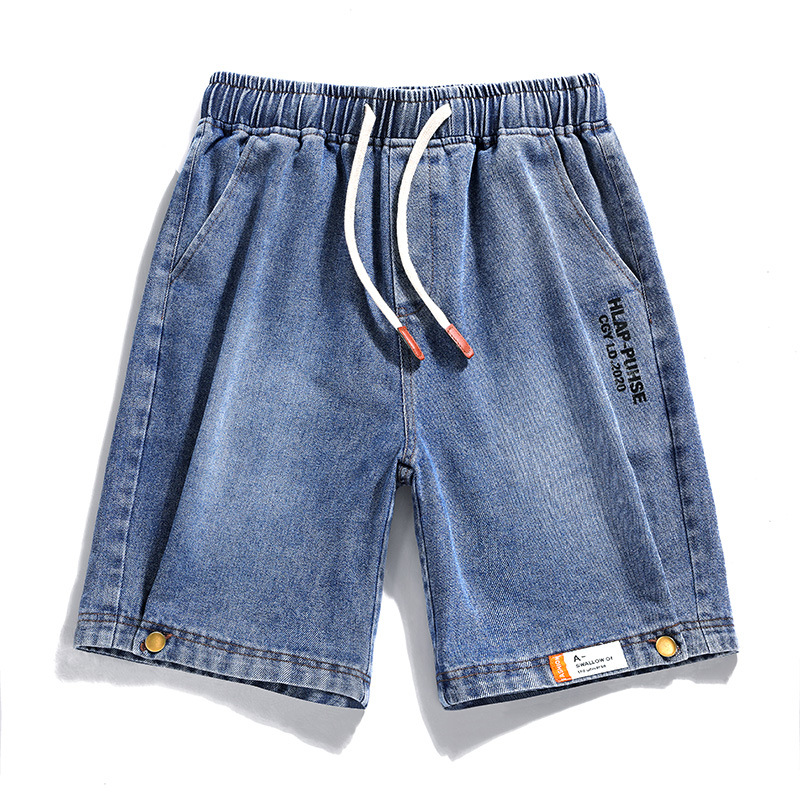 Cool loose denim shorts for men, trendy mid-waist style with pockets, perfect for casual fashion.