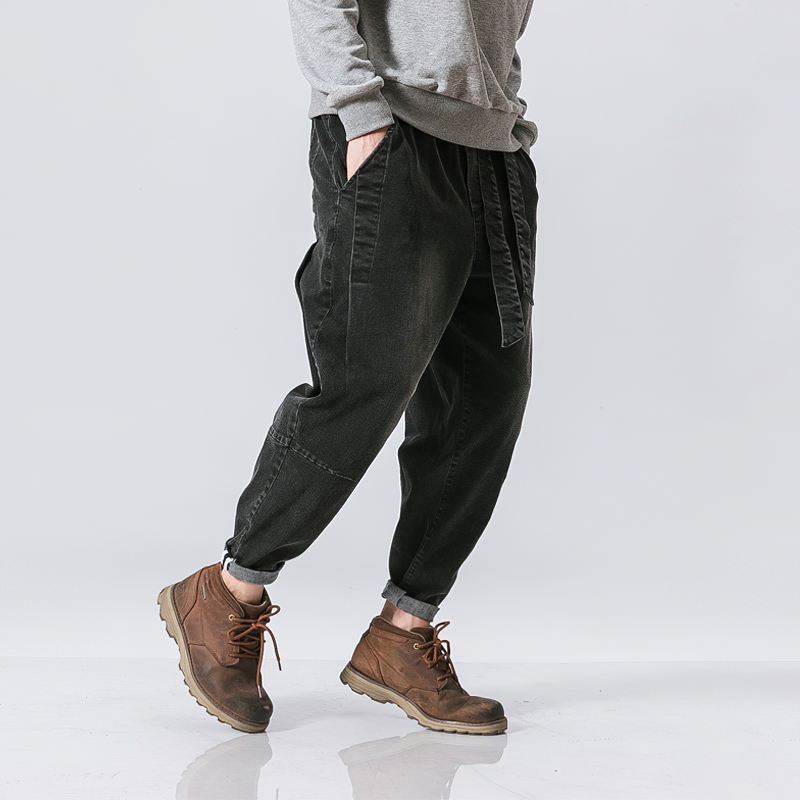 Cool loose jeans for men, retro jogger pants with ribbons, styled with a relaxed fit and elastic waist.