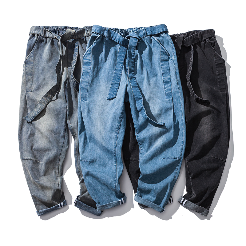 Three pairs of cool loose jeans for men in denim shades, featuring elastic waist and stylish ribbons for alternative fashion.