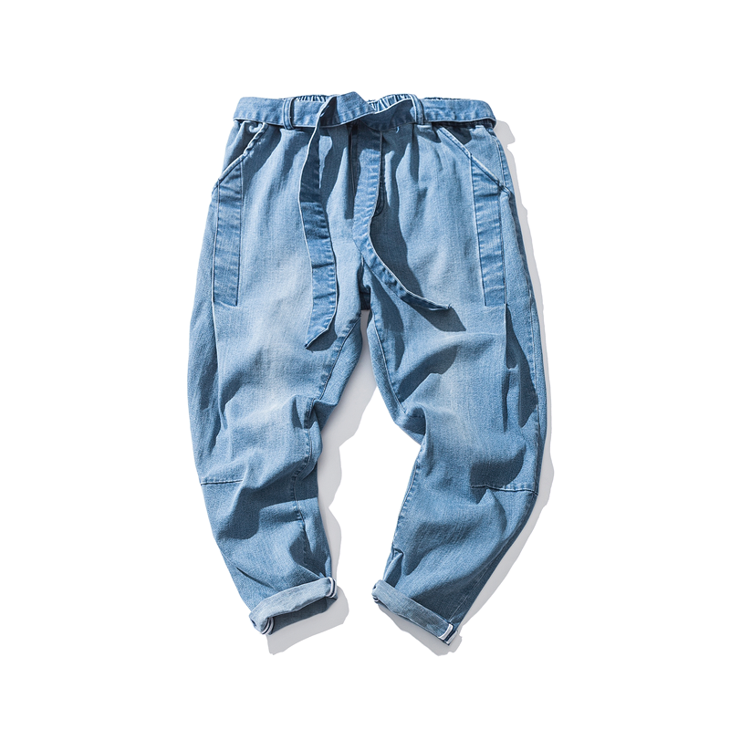 Cool loose jeans for men with an elastic waist and stylish ribbons, perfect for alternative fashion and casual wear.