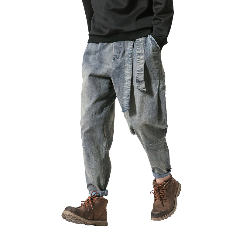 Casual loose jeans for men with elastic waist and stylish ribbons, perfect for alternative fashion and comfort.