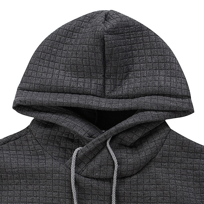 Close-up of a cool men's rock style hoodie featuring a hood and textured fabric in dark gray.