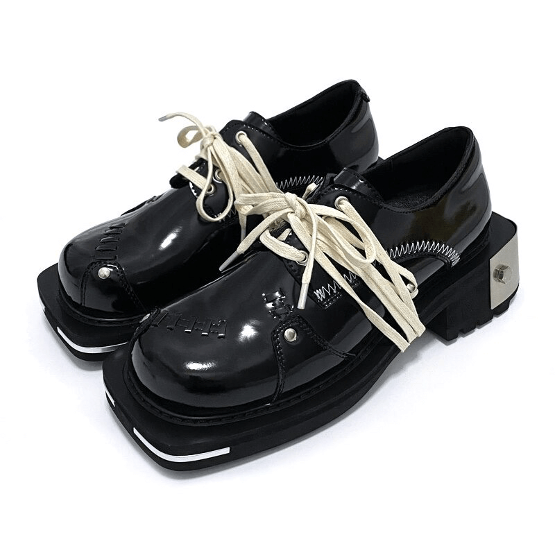Cool men's thick-soled black leather shoes with white laces in punk style, featuring a unique design and metal accents.