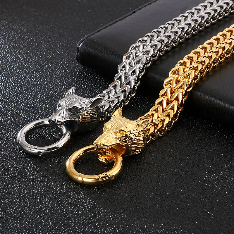 Cool men's stainless steel bracelet featuring wolf head design in silver and gold rock style.