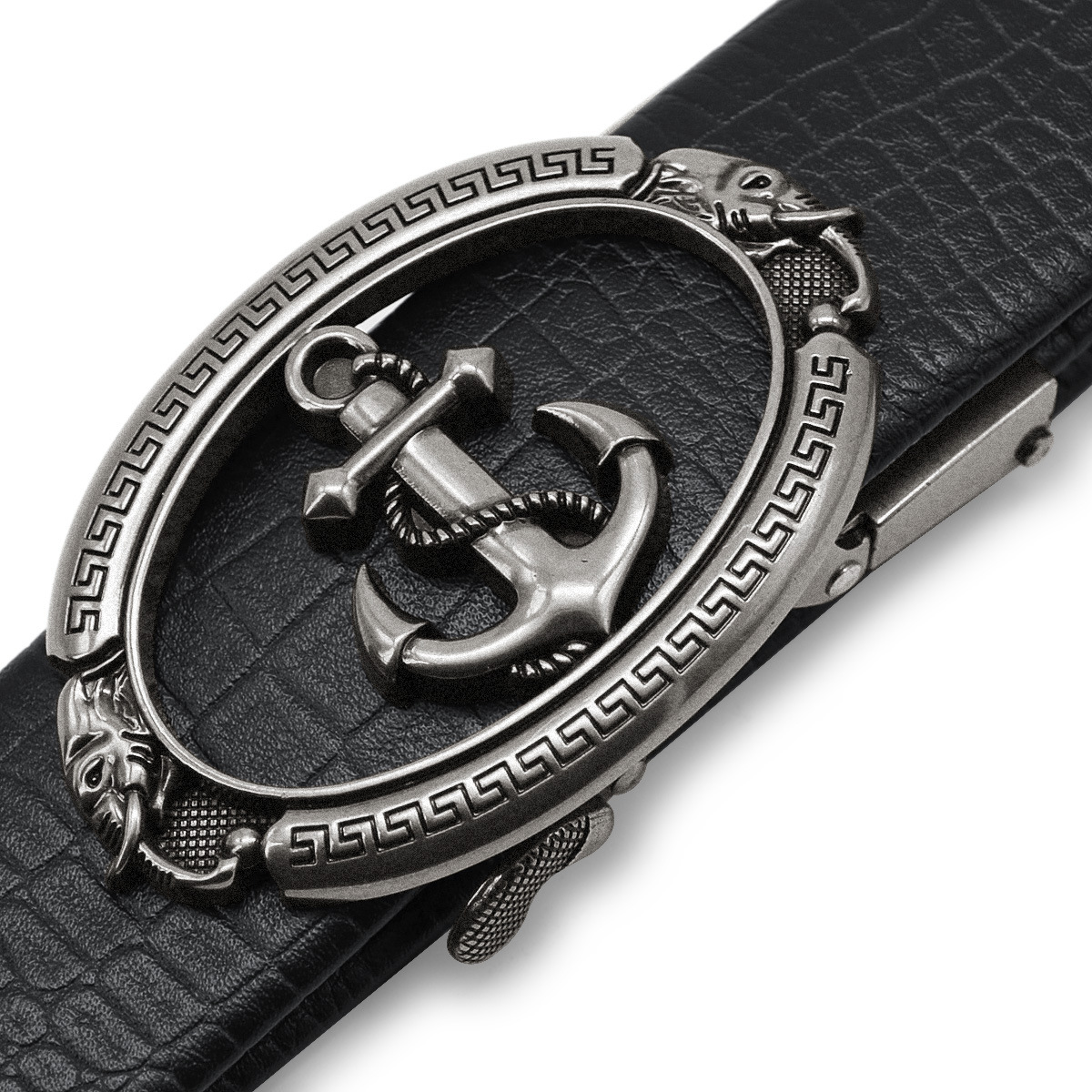 Close-up of a vintage anchor buckle on a cool men's leather belt, featuring detailed designs and a retro style.
