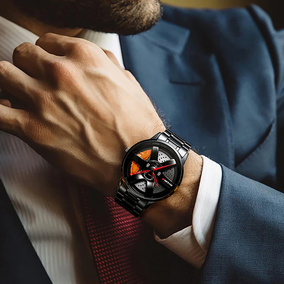 Cool vintage men's quartz watch on a stylish hand in a suit, showcasing biker elegance and stainless steel design.