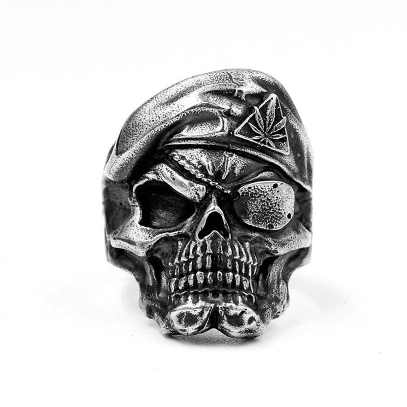 Cool men's skull ring in vintage punk style made of sterling silver, perfect accessory for edgy looks.