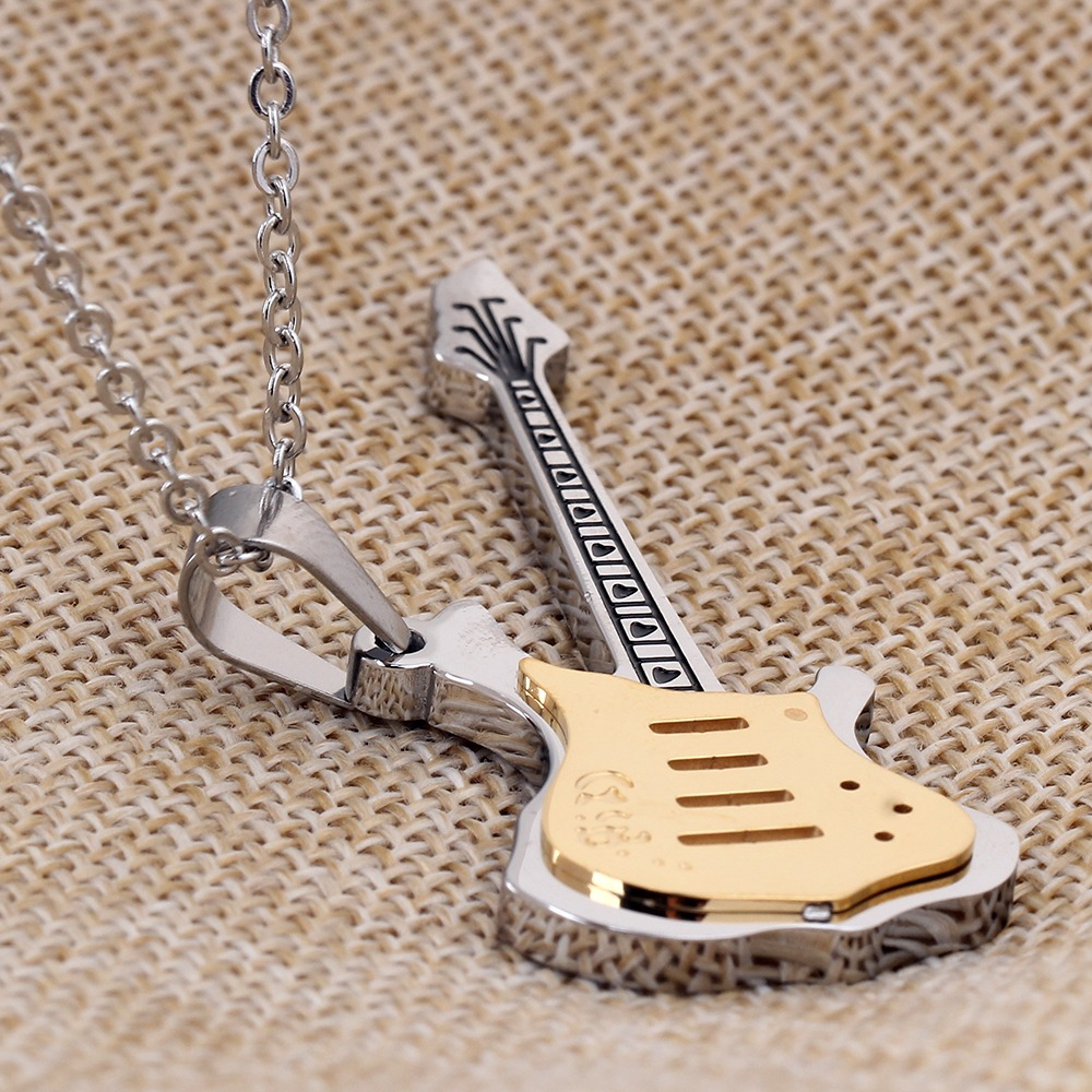 Cool metal chain guitar necklace pendant with gold detailing, perfect for punk and alternative fashion.
